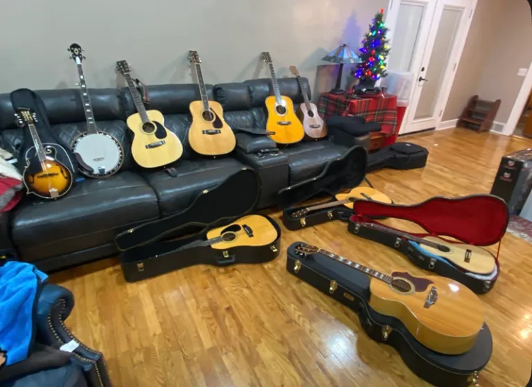 Donated guitars and stringed instruments for Pick-and-Bow students