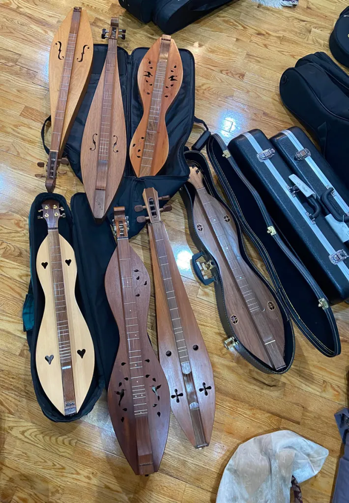 Mountain dulcimers provided for Pick-and-Bow students