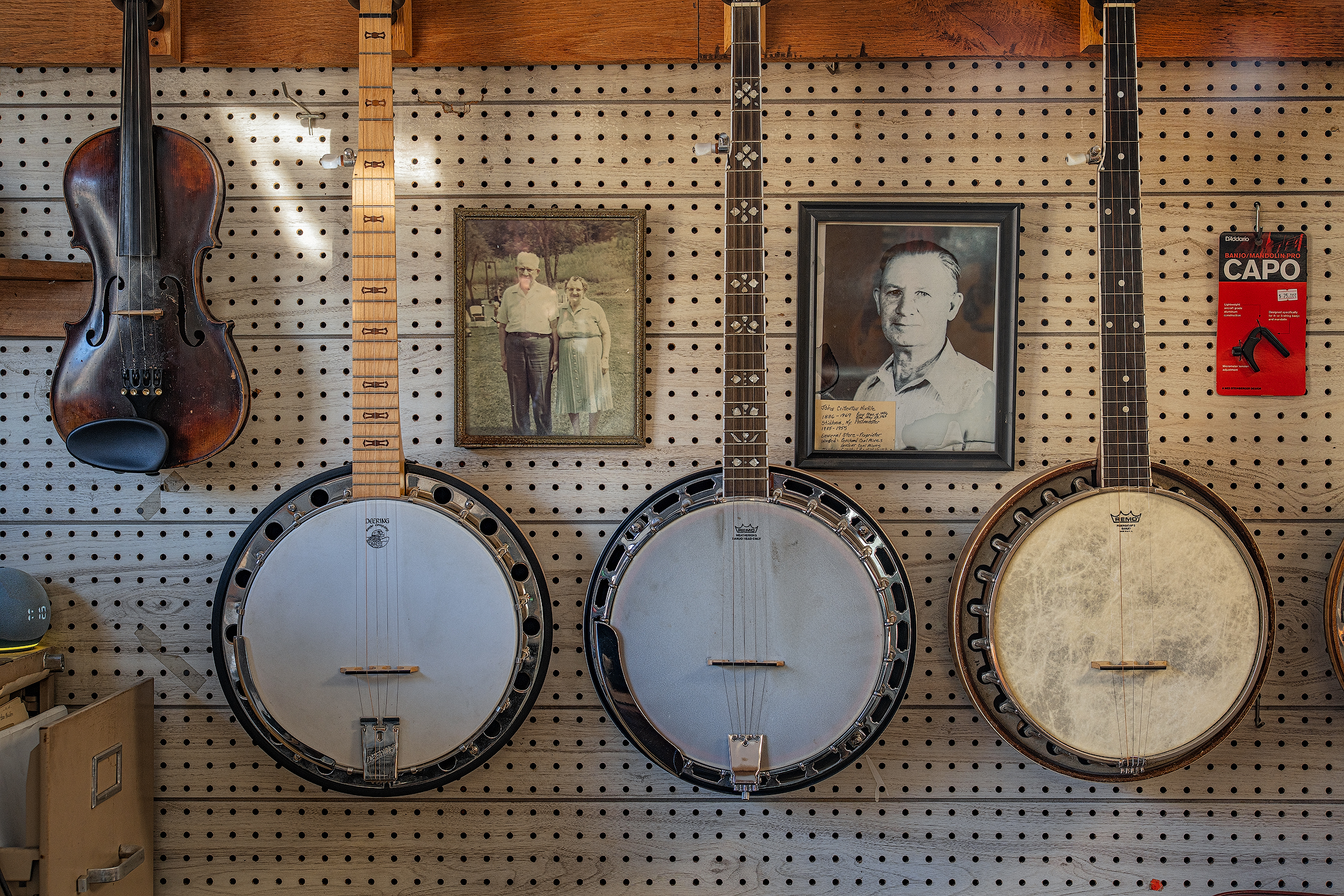Vintage banjos displayed inside Webb Music Shop