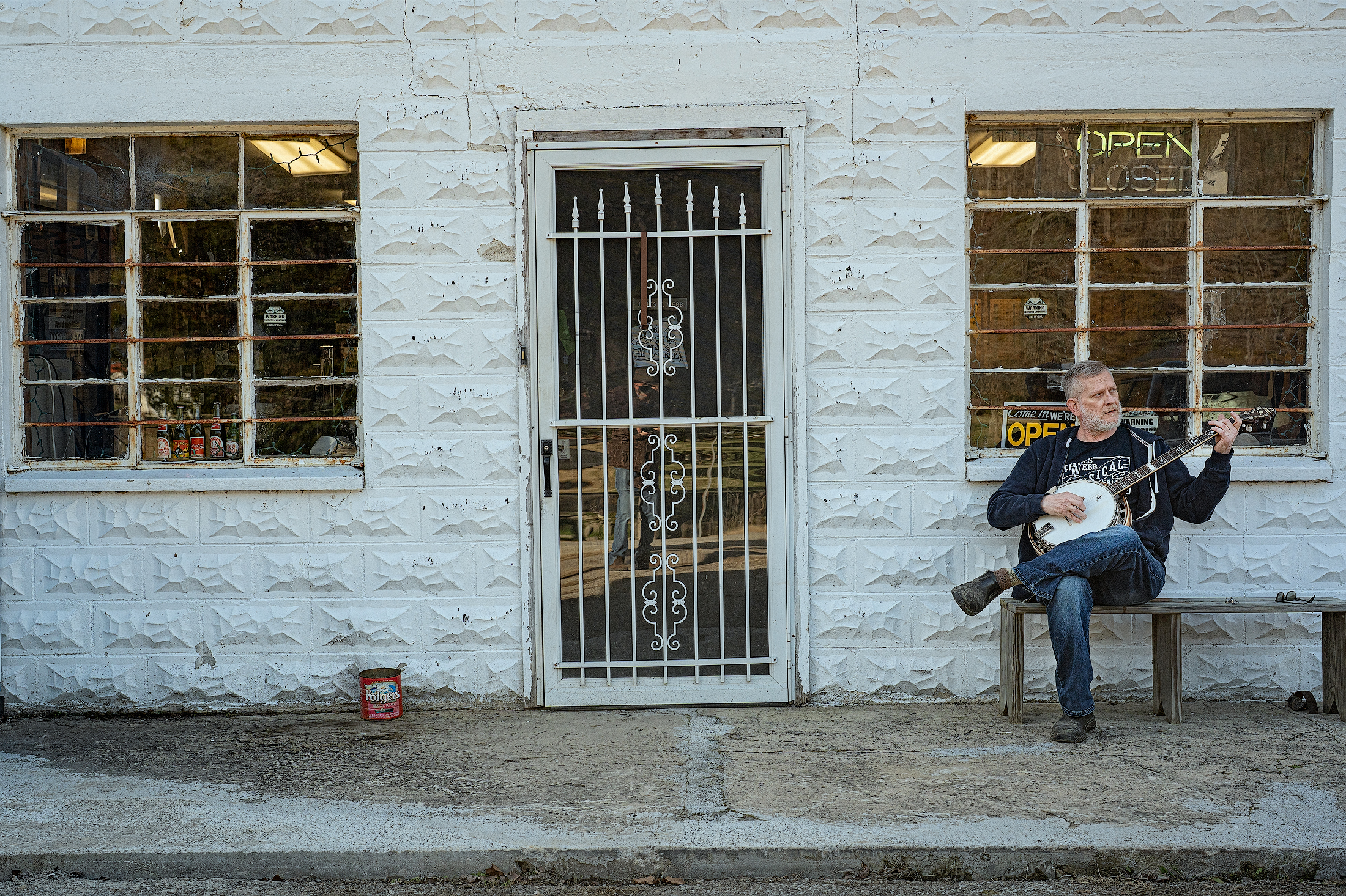 Jimmy Webb standing outside Webb Music Shop